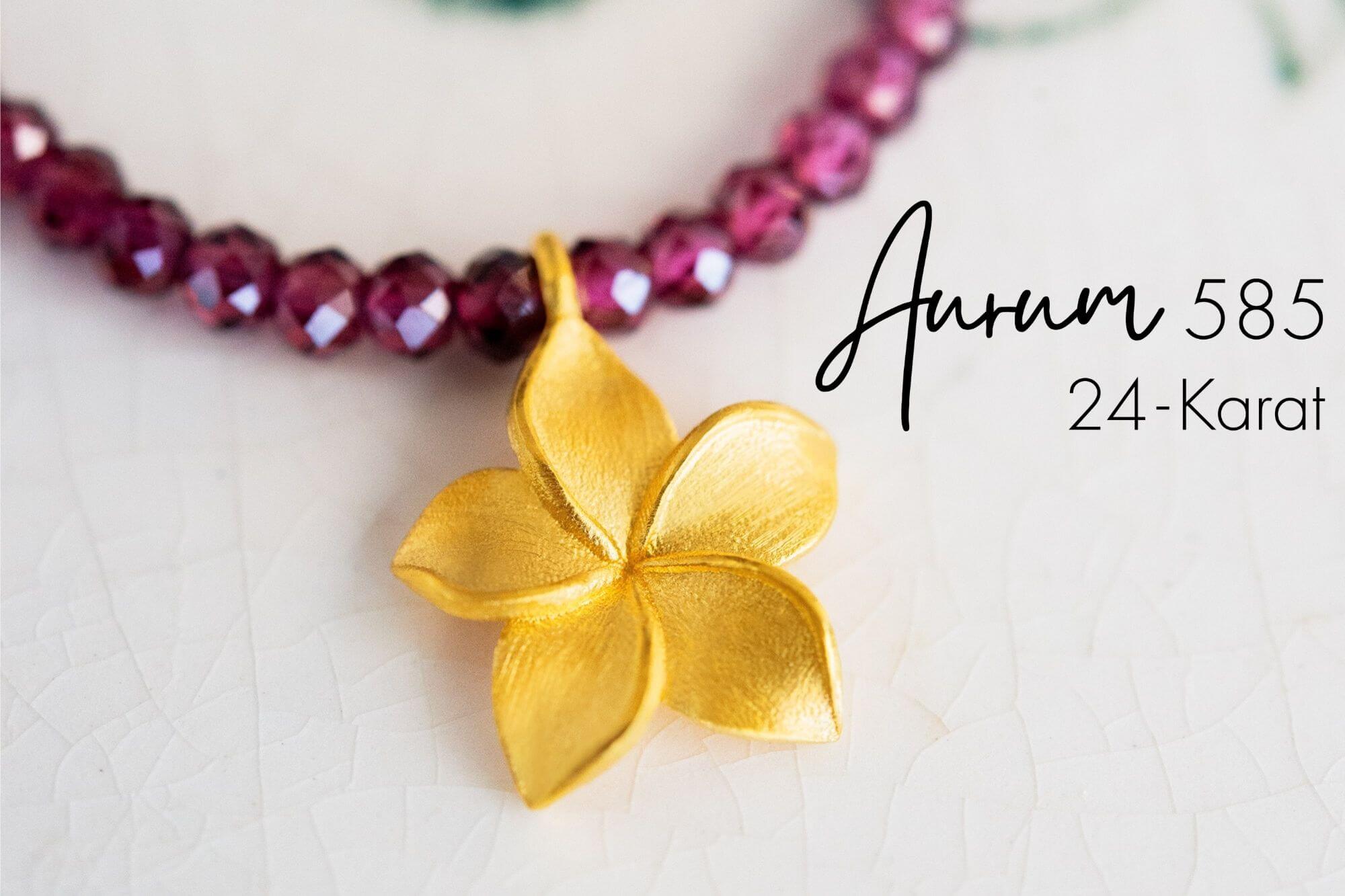 Aurum 585 -  Reines 24K Gold auf 14K Gold