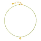 Kette mit Anhänger Kleenfa von BERND WOLF aus 24-Karat-goldplattiertem Sterlingsilber mit Peridot, Designlinie Glücksbringer.