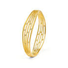 Armreif Selma von BERND WOLF aus 24-Karat-goldplattiertem Sterlingsilber mit Zirkonia, Designlinie Swing.