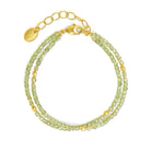 Armkette Cusenia von BERND WOLF aus 24-Karat-goldplattiertem Sterlingsilber mit Peridot, Designlinie Cubes.