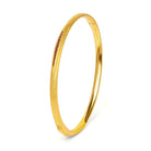 Armreif Veniza von BERND WOLF aus 24-Karat-goldplattiertem Sterlingsilber mit Granat, Designlinie Navette.
