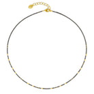 Halskette Tabaci von BERND WOLF aus 24-Karat-goldplattiertem Sterlingsilber mit Hämatin matt, Designlinie Cleopatra.