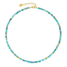 Halskette Fabella von BERND WOLF aus 24-Karat-goldplattiertem Sterlingsilber mit Türkis blau, Designlinie Cubes.
