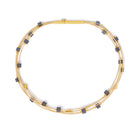 Armreif Cubetina von BERND WOLF aus 24-Karat-goldplattiertem Sterlingsilber mit Hämatin matt, Designlinie Cubes.
